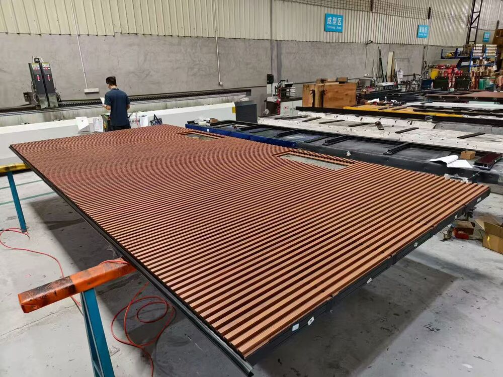 Wood-look garage door panels in production at Senhai's factory