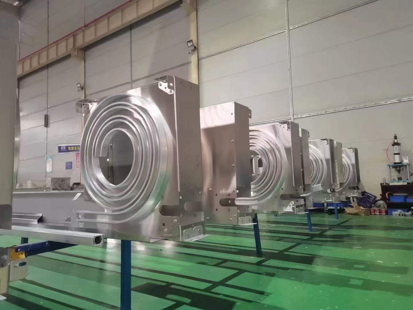 Workshop row of vertical spiral-guide cassette assemblies for turbine rapid doors